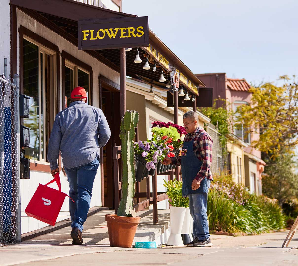 Dasher walking into a flower store