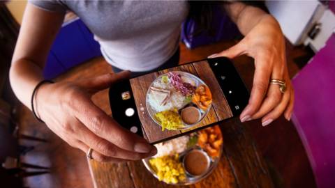 Taking a picture of a meal on a phone