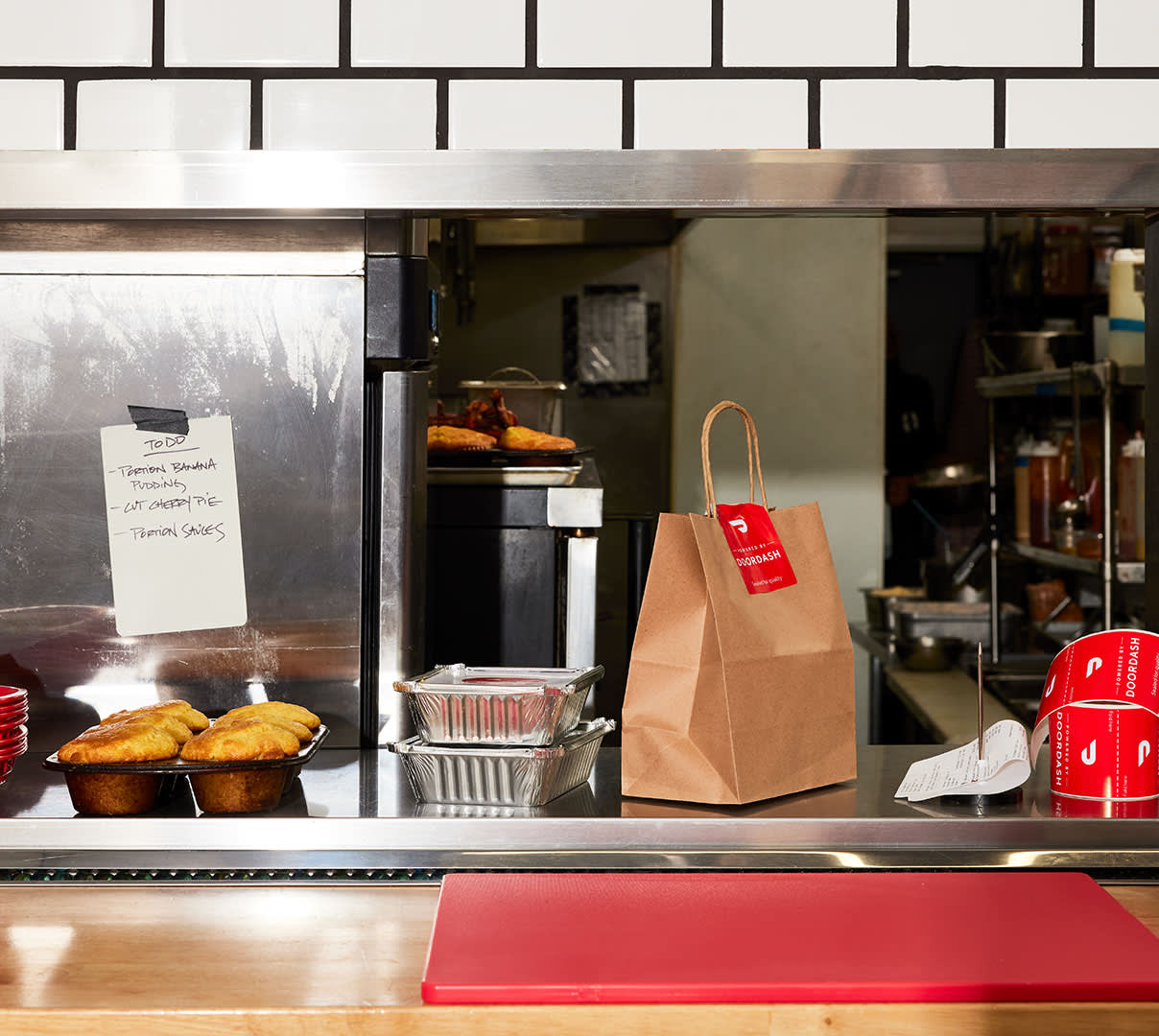 Mx - DoorDash bag and muffins on counter