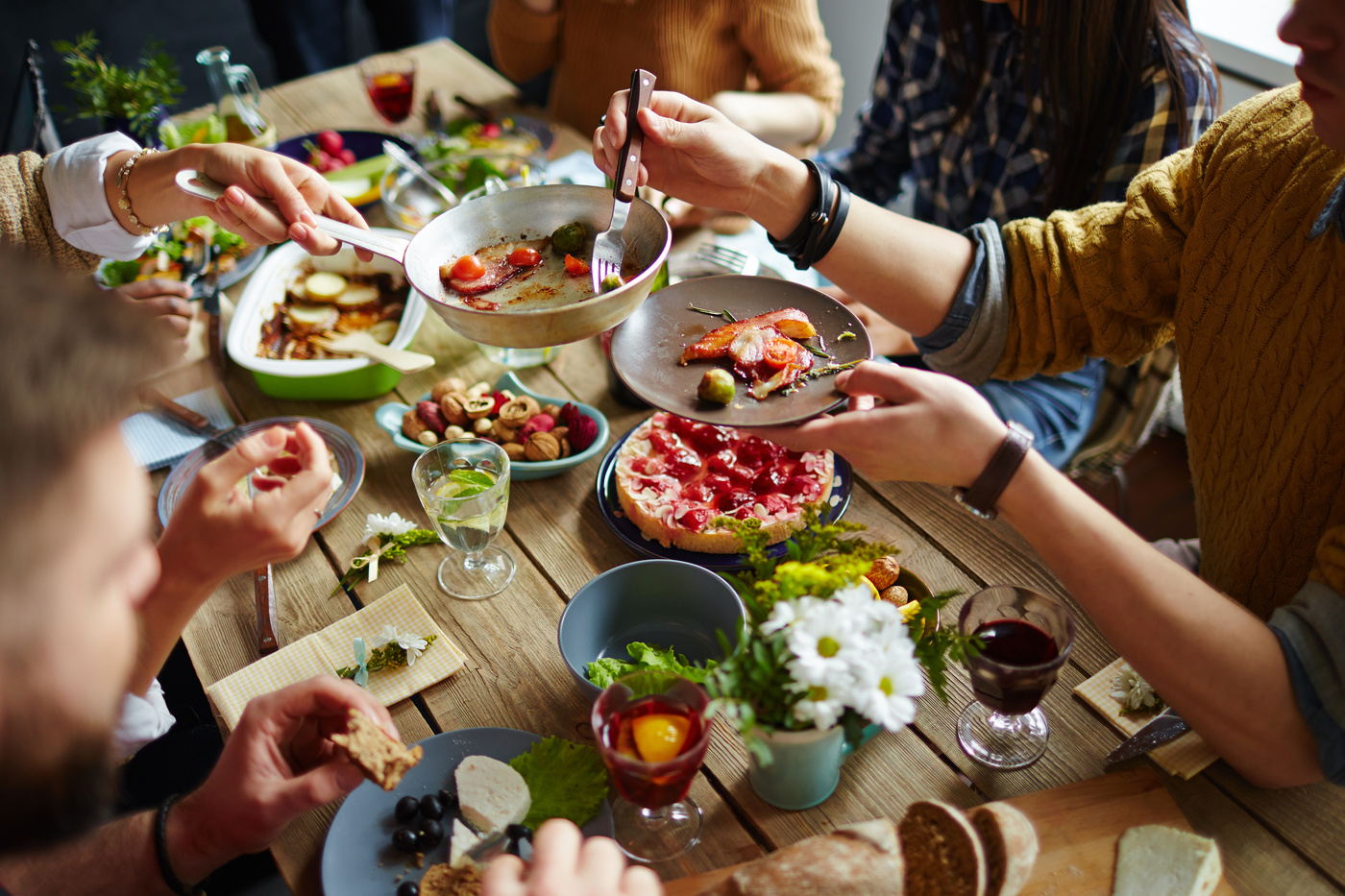 A group of people sharing their lunch