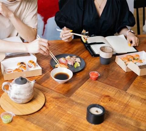 DDfB - Blog - How to Celebrate Cultural Diversity in the Workplace Through Food - eating sushi
