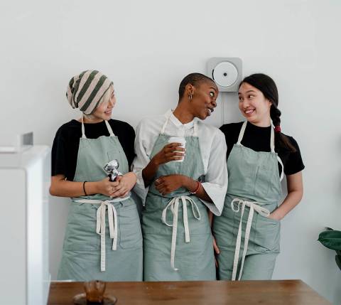 DDfW - Blog - How to Show Employee Appreciation: A Leadership Guide - Smiling kitchen workers