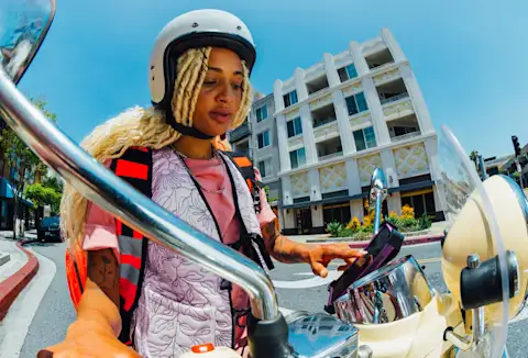 Dx Dasher on bike with visibility vest