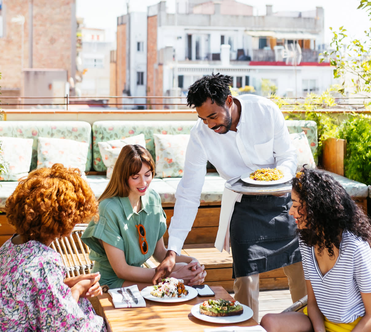 Blog Hero - waiter working at outdoor patio