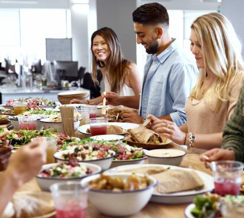 Team enjoying a group lunch together