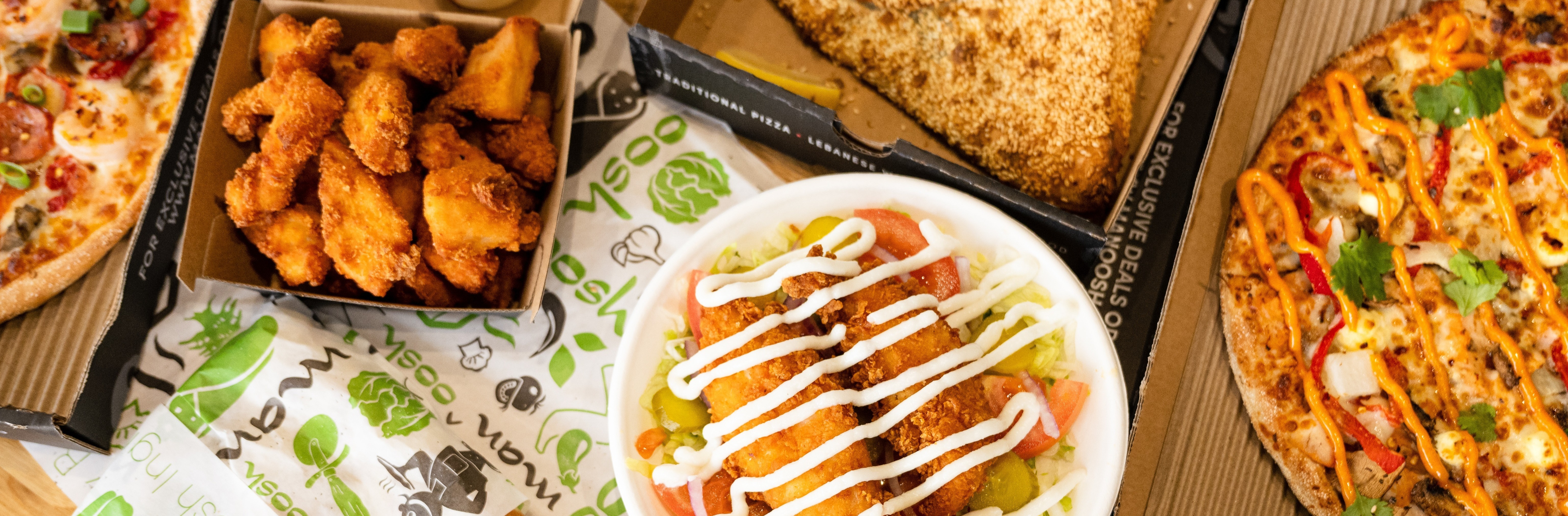 Table of different food items from Manoosh Pizzeria