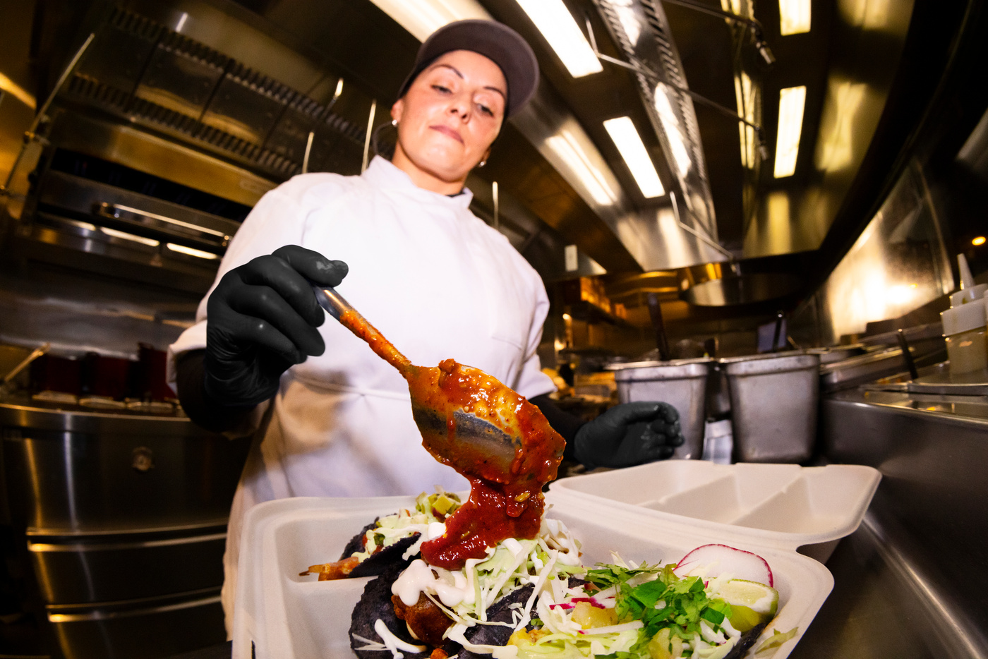 woman-cooking-in-restaurant