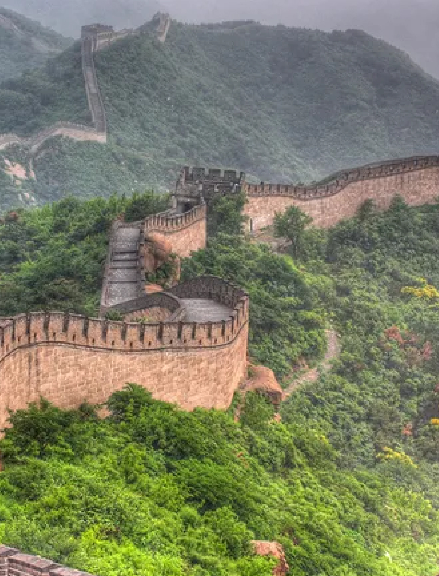 the Great Wall of China winding over mountainous terrain