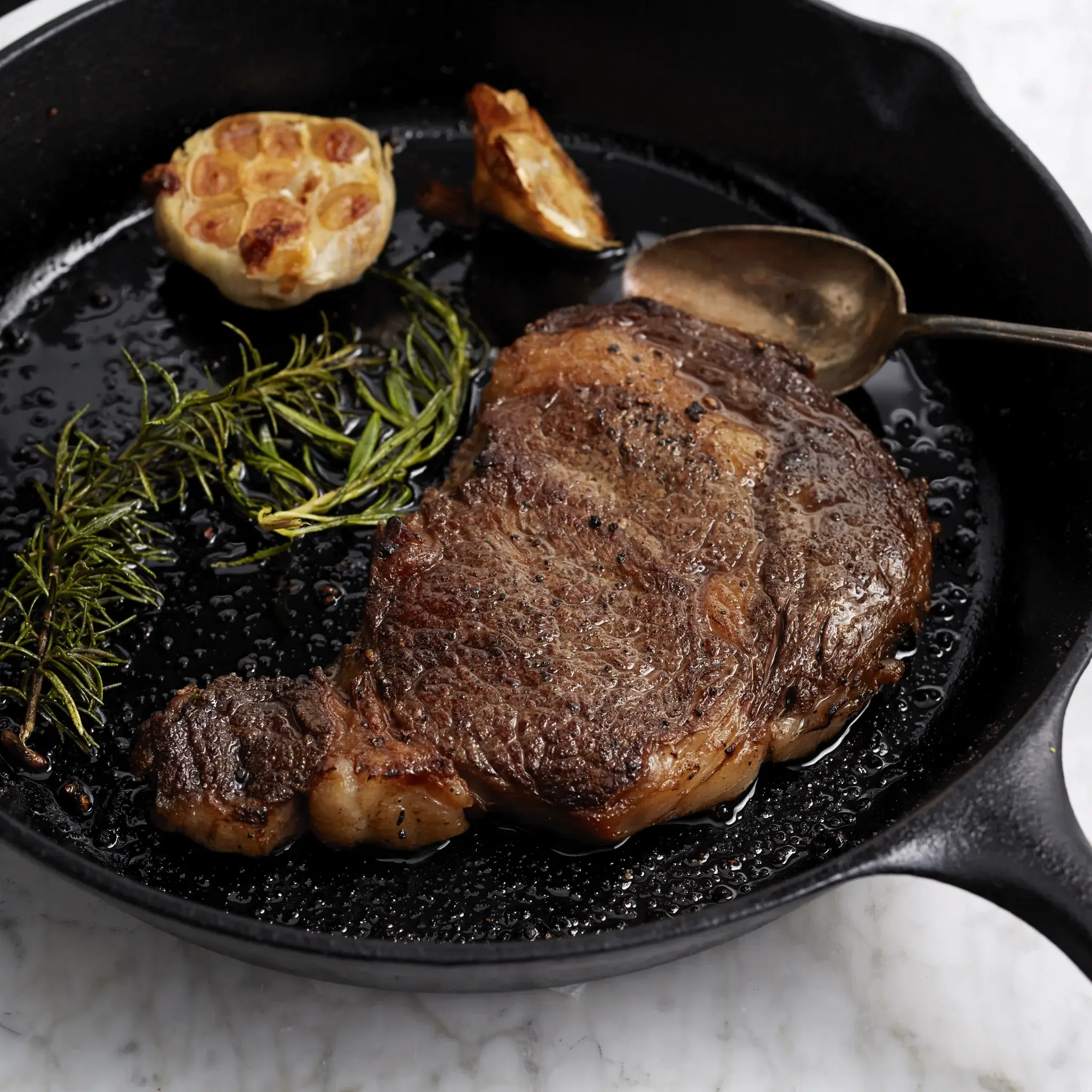 PLU_WF_PLATED_Ribeye Steak ABF Choice lbs VSP Cooked_Beef.webp