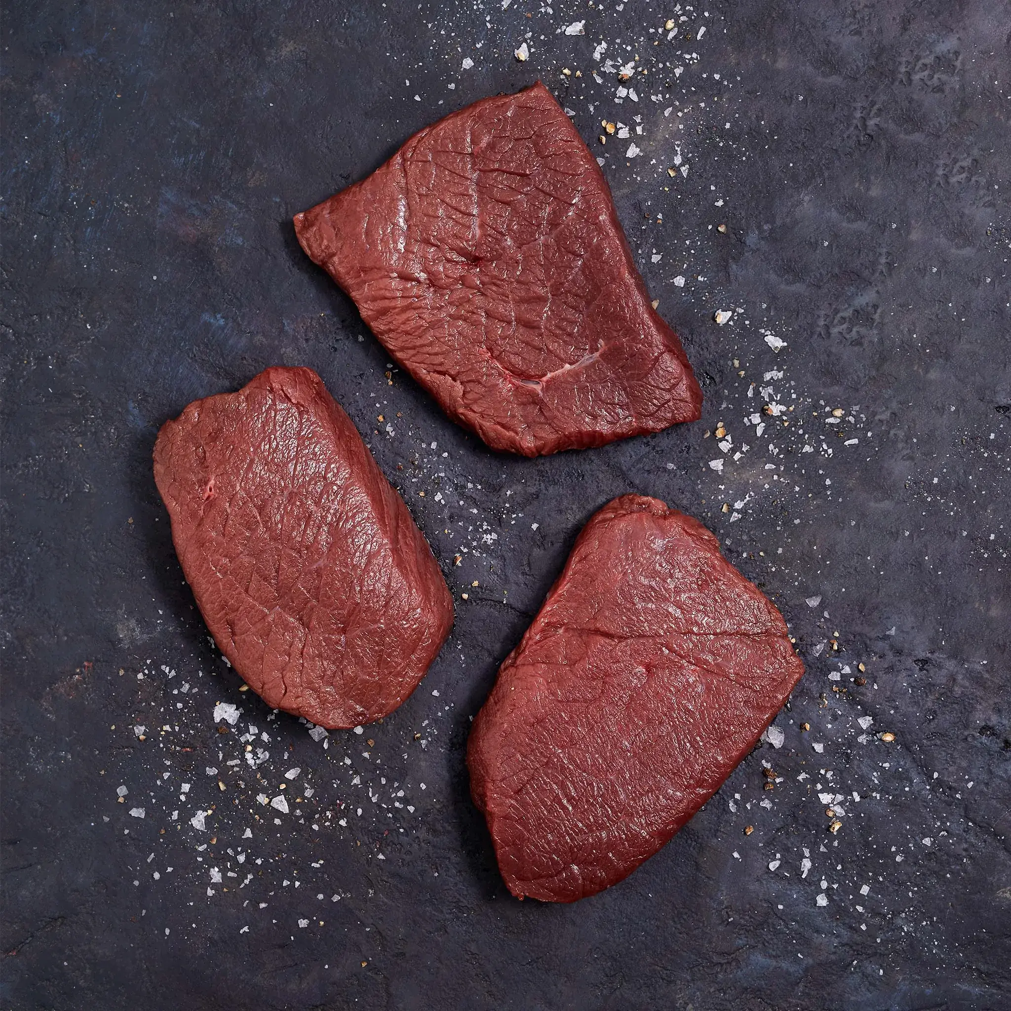 5718 WF RAW ELK MEDALLIONS - FOSSIL FARMS SPECIALTY