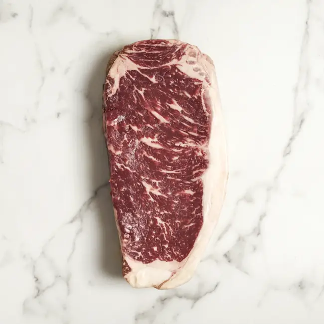 PLU_WF_Raw_NY_Strip_Steak_Wagyu_Beef.webp