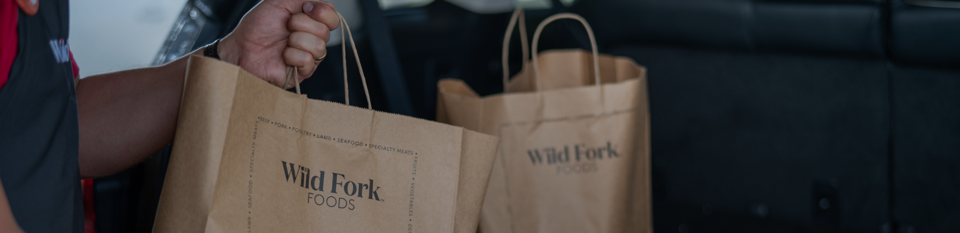 Bags being loaded into car 1920 px / 467 px png