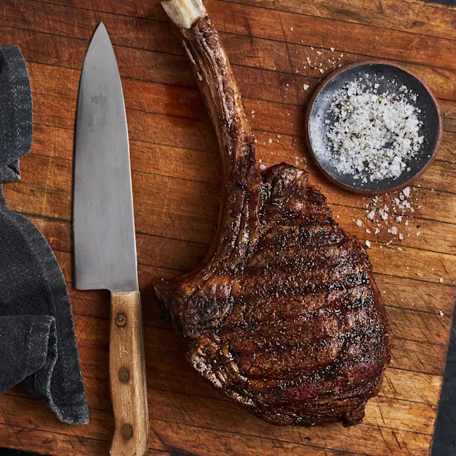 1188 WF PLATED Tomahawk Steak Truffle Steak Fries Plated Beef