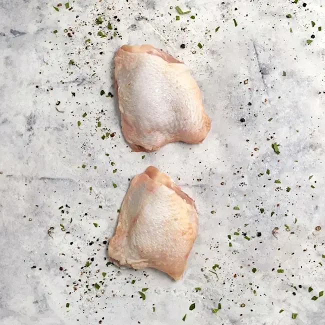 WFC_7046_Chicken_Thighs_BISkinOn_Raw.webp