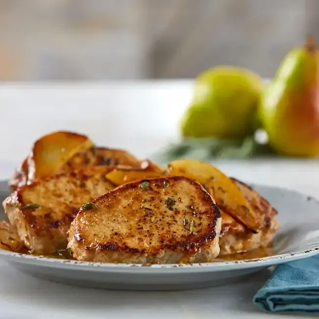 26934_WF_PLATED_Beer_Braised_NY_Pork_Chops_Pork.webp
