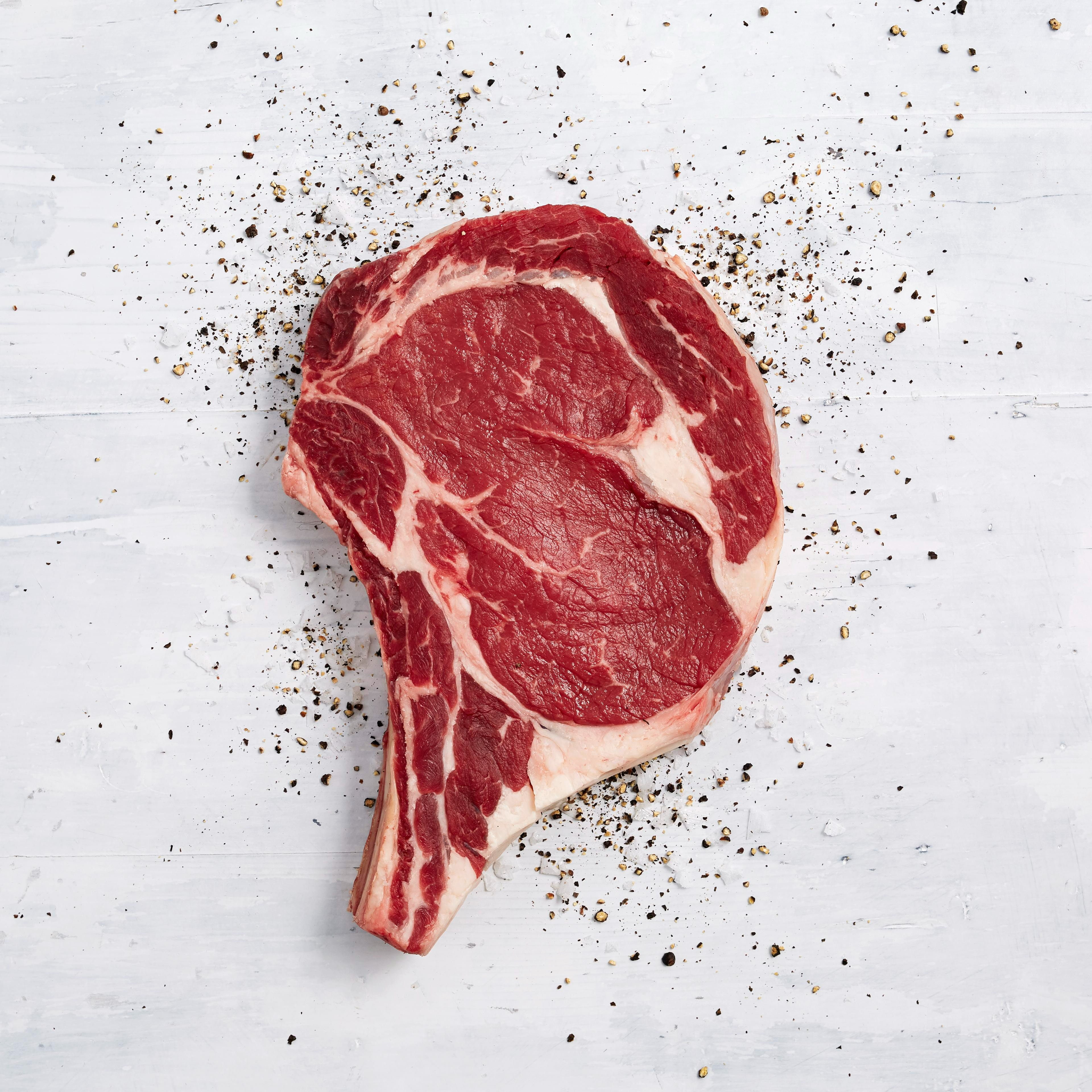 1179 WF Raw USDA Choice Bone-In Beef Ribeye Steak Beef