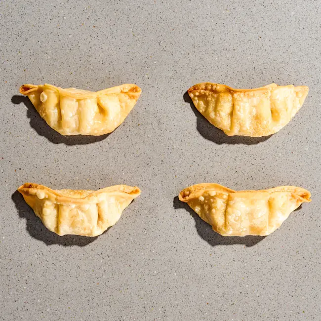 8306 RAW Korean Kimchi Pork Potstickers 
