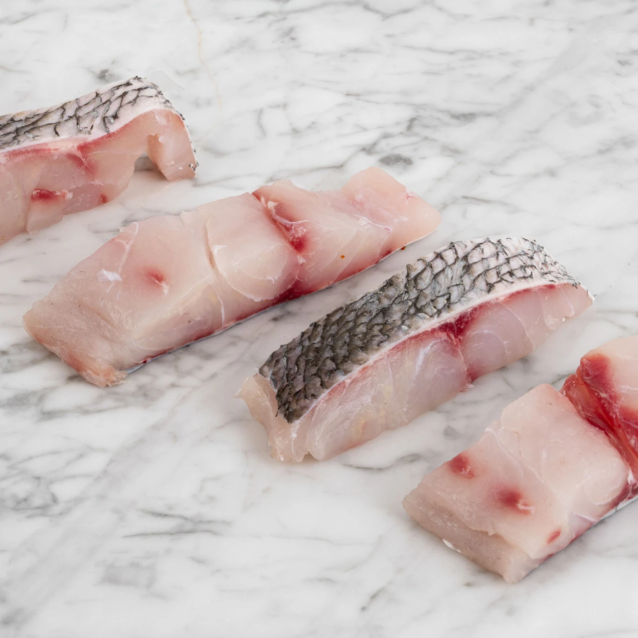 81945_WFMex_Raw_PORCIONES DE TOTOABA CON PIEL_Pescado