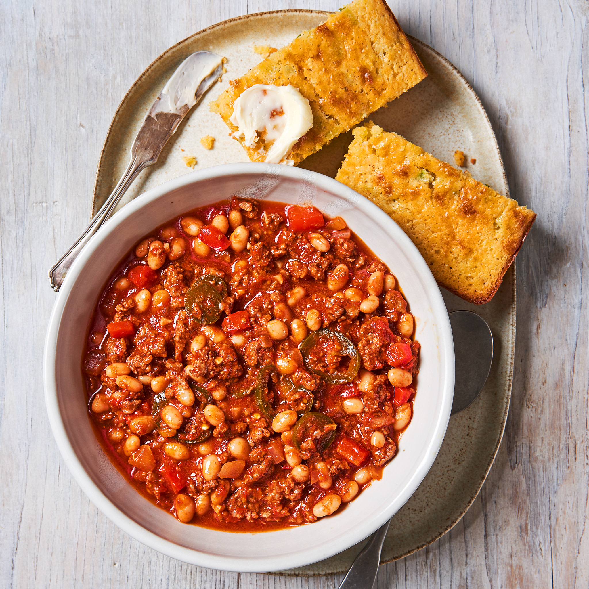 5704 WF PLATED Ground Venison and White Bean Chili with Jalapeno Skillet Cornbread Specialty Meats