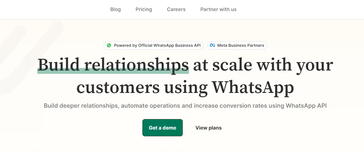 double tick homepage promotes whatsapp api with demo and view plans buttons.