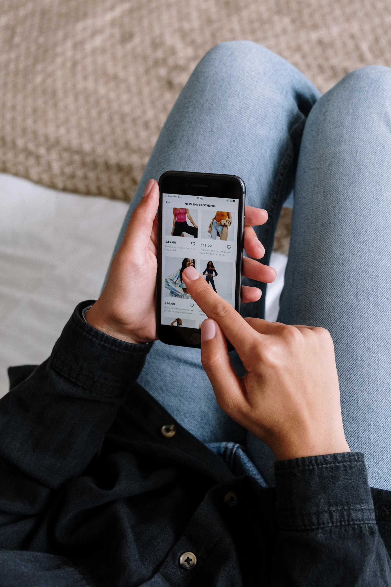person holding black Android smartphone shopping online