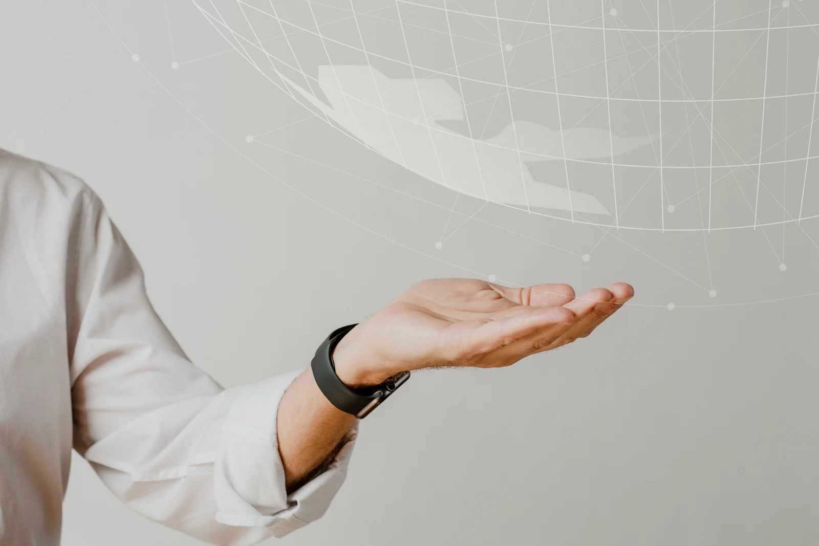 Person holding out their hand beneath a digital globe with connected data points, symbolizing global AI networks.