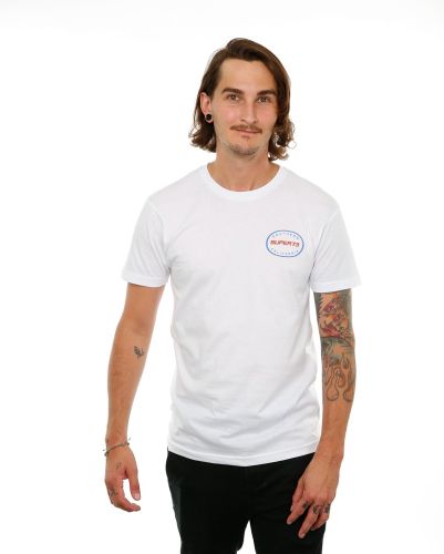 Front view of male model in White Oval Tee on white background.