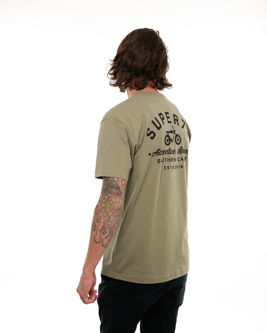 Side view of male model in Light olive Adventure Short Sleeve T-Shirt on white background.