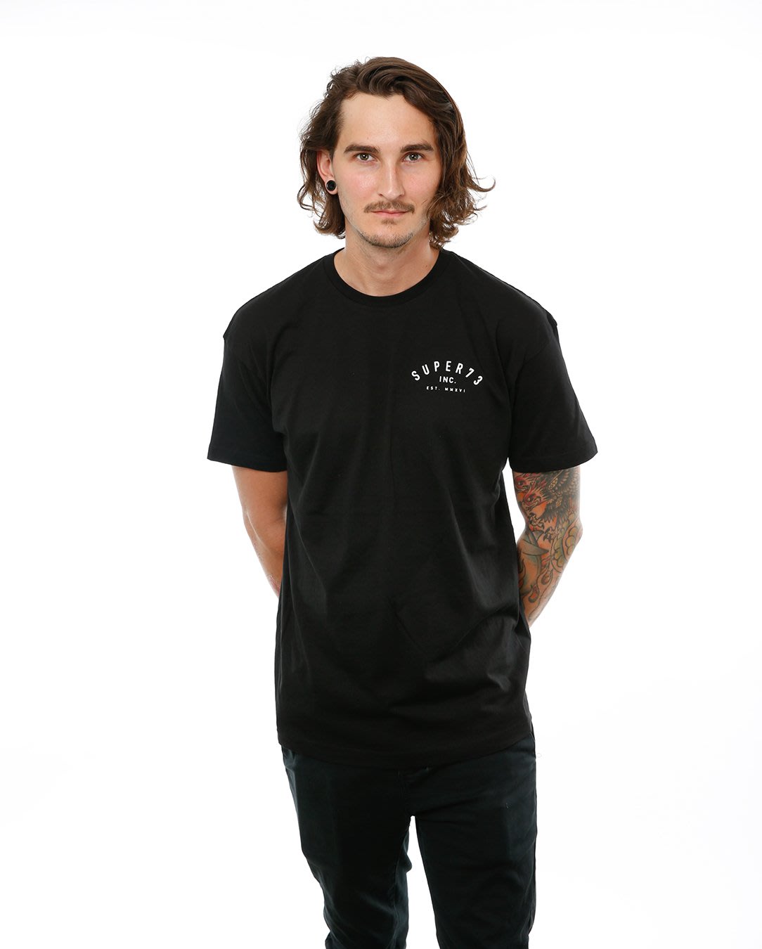 Front view of male model in Black Classic Short Sleeve T-Shirt on white background.