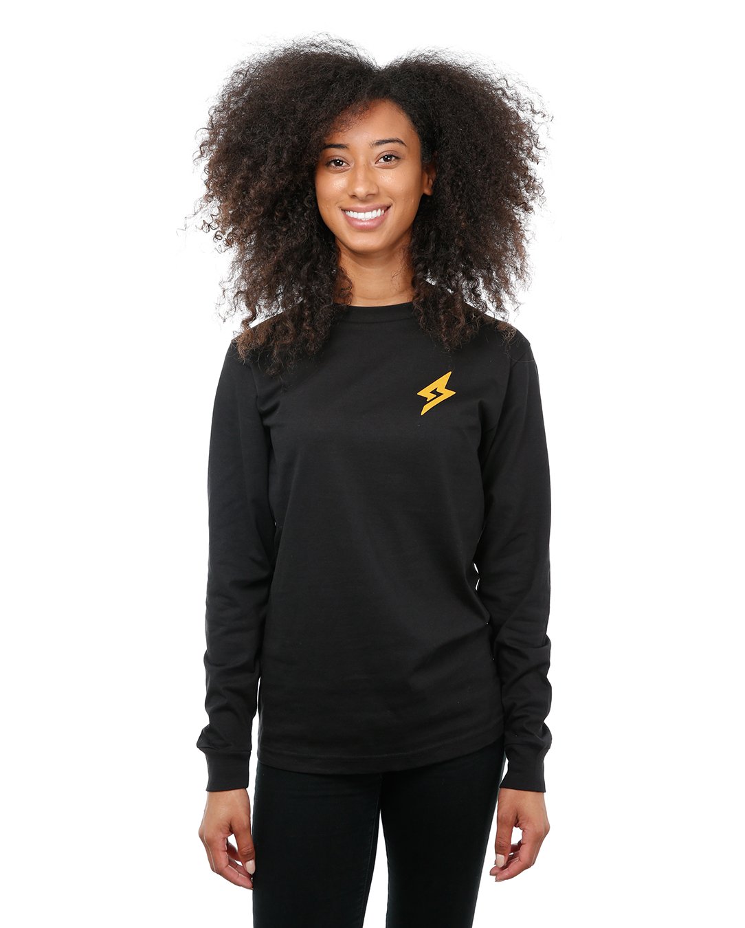 Front view of female model in Black Adventure Long Sleeve T-Shirt on white background.