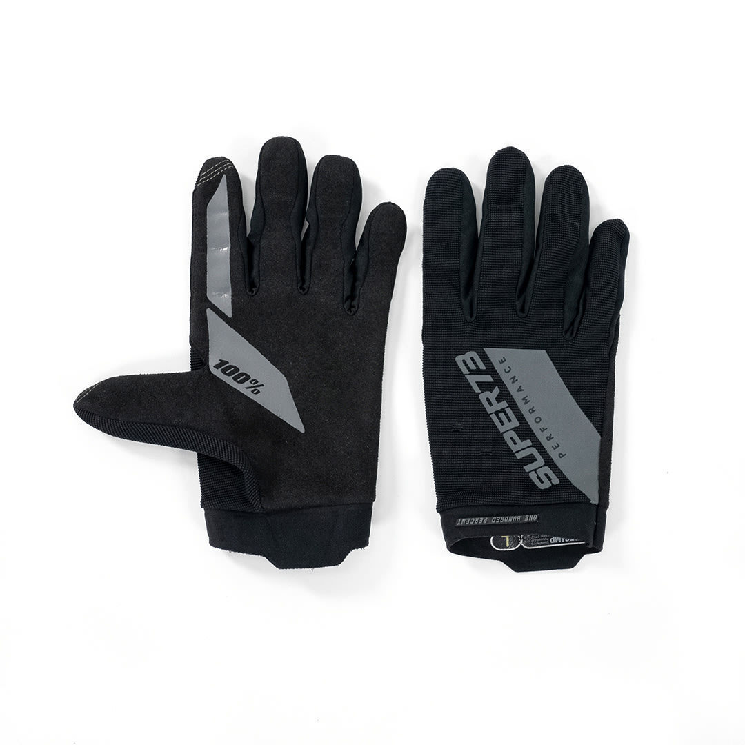 Flat lay view of a pair of 100% x Super73 Ridecamp Glove.