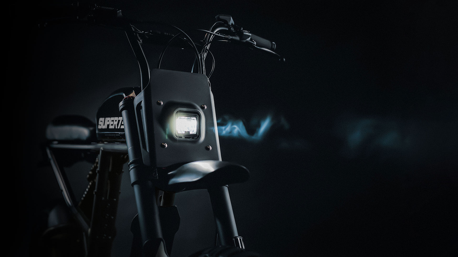 Closeup of the new RX Mojave headlight shining out across a black background