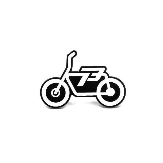 Front view of Super73 squad pin.