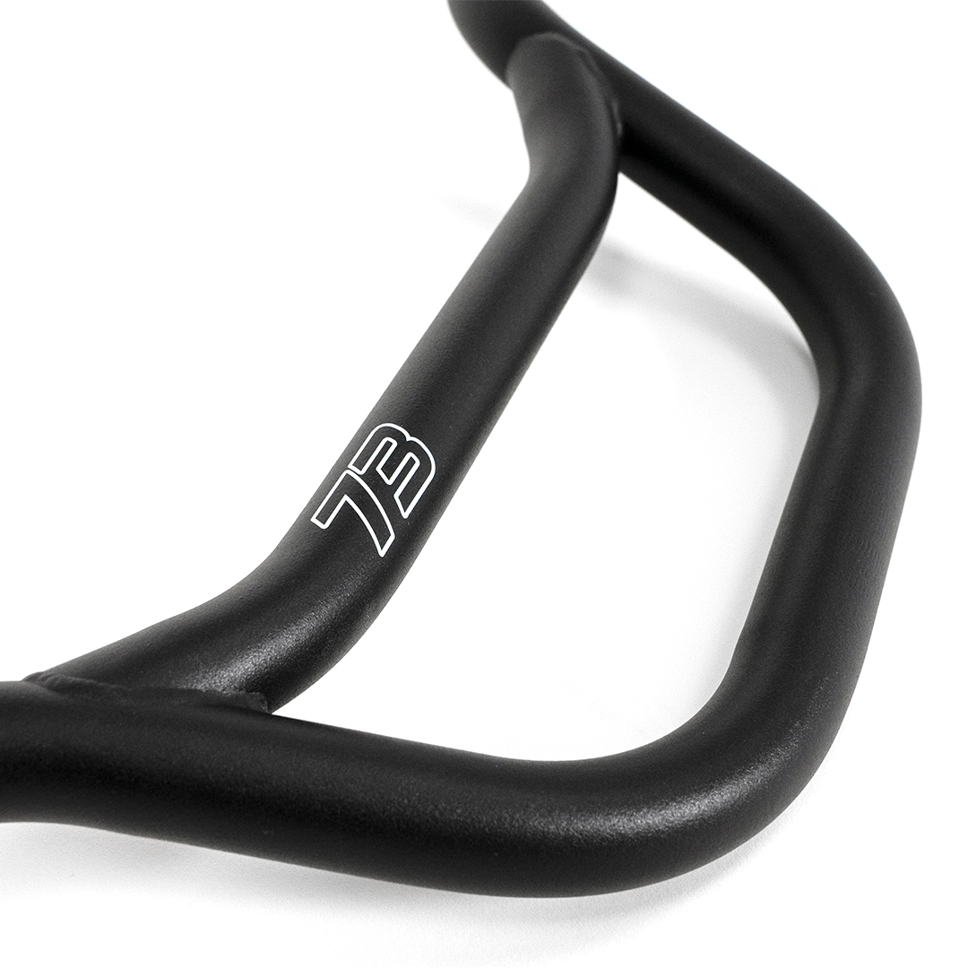 Blaine handlebar on white background with 73 logo
