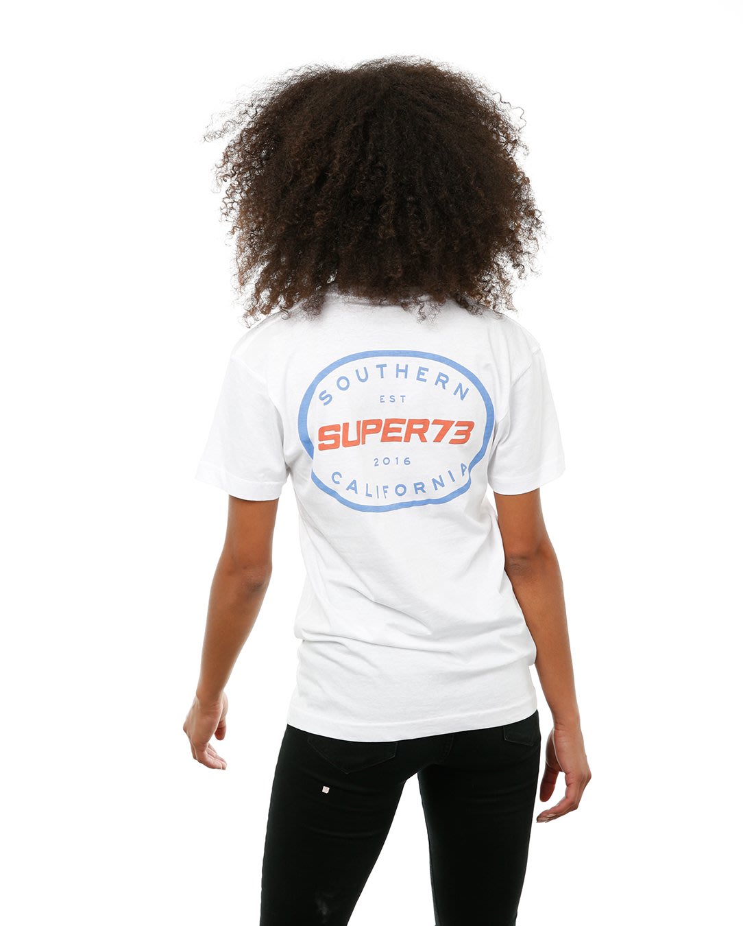 Back view of female model in White Oval Tee on white background.