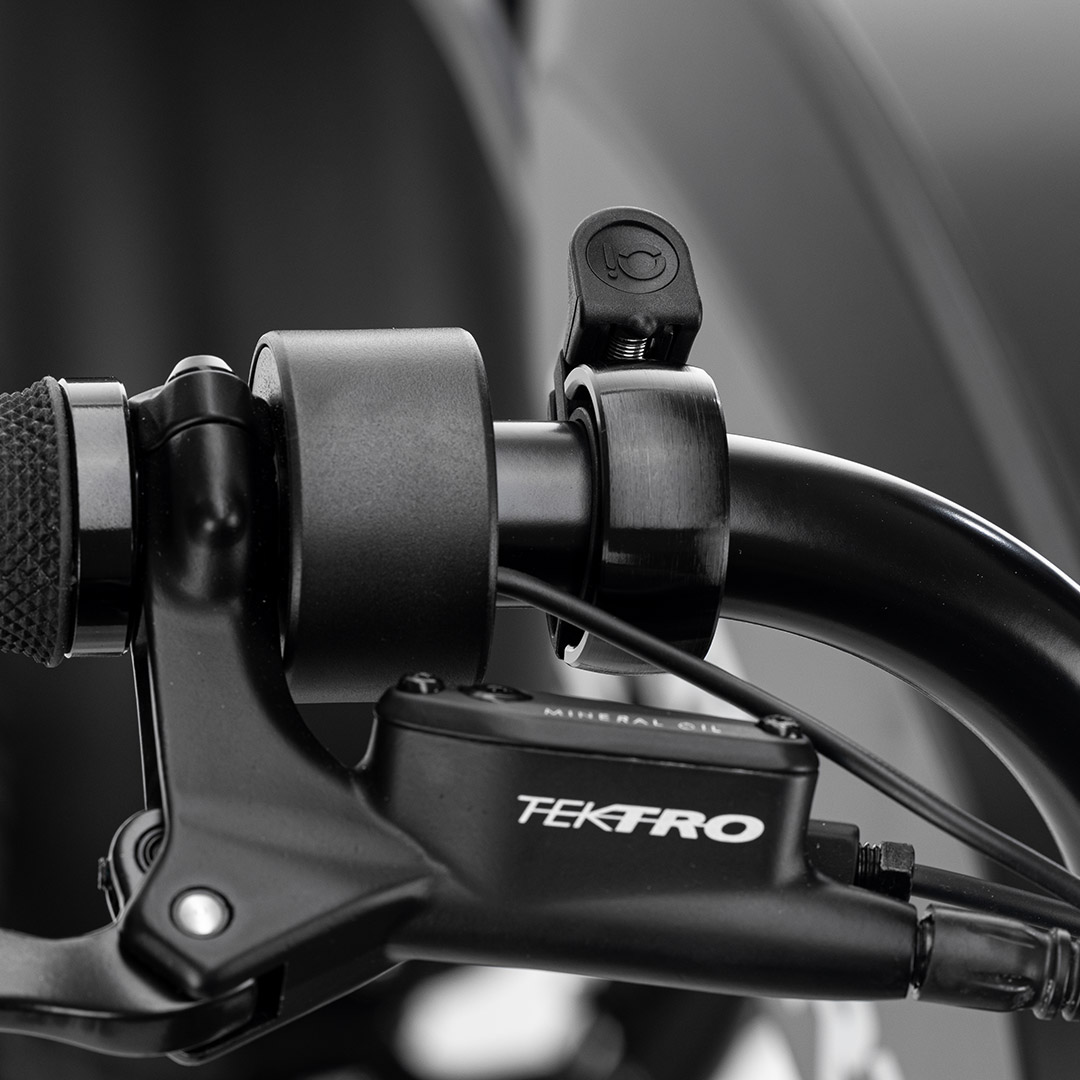 Bell mounted on bike.