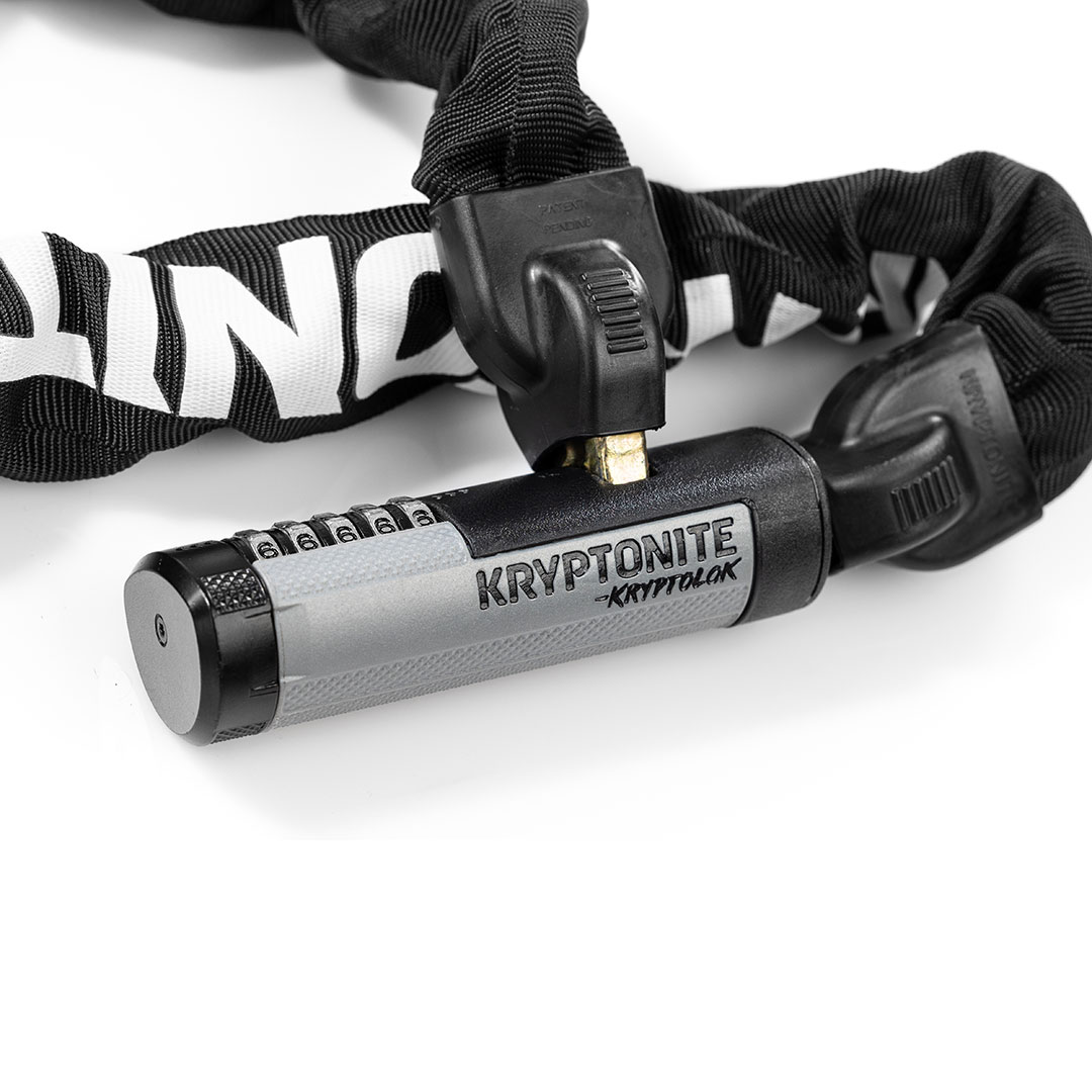 Kryptonite 990 lock on white background closeup with key