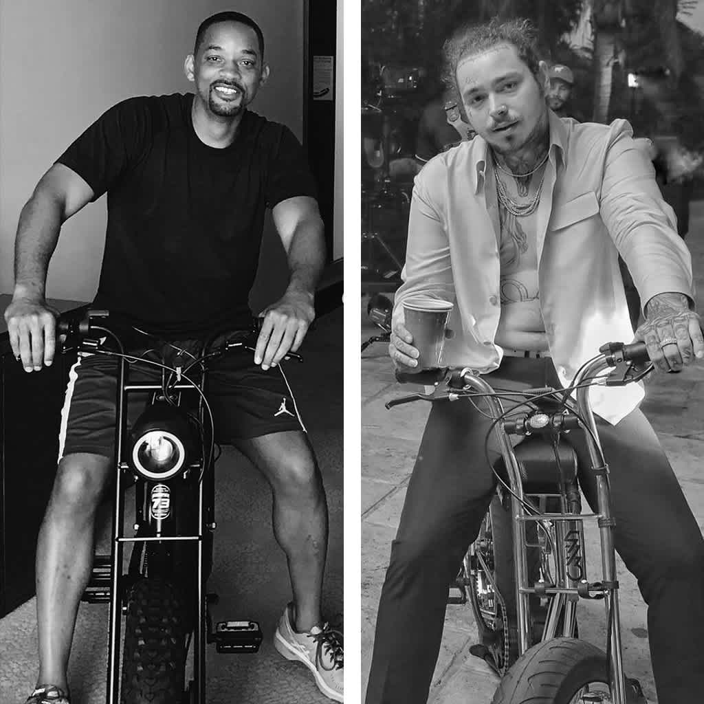Black and white image of Will Smith and Post Malone sitting on Super73 vehicles.