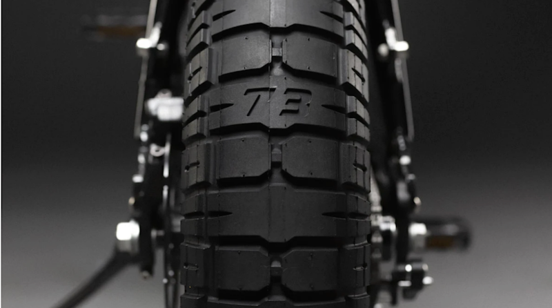 73 Wheel Closeup of a tire showing the 73 logo embedded