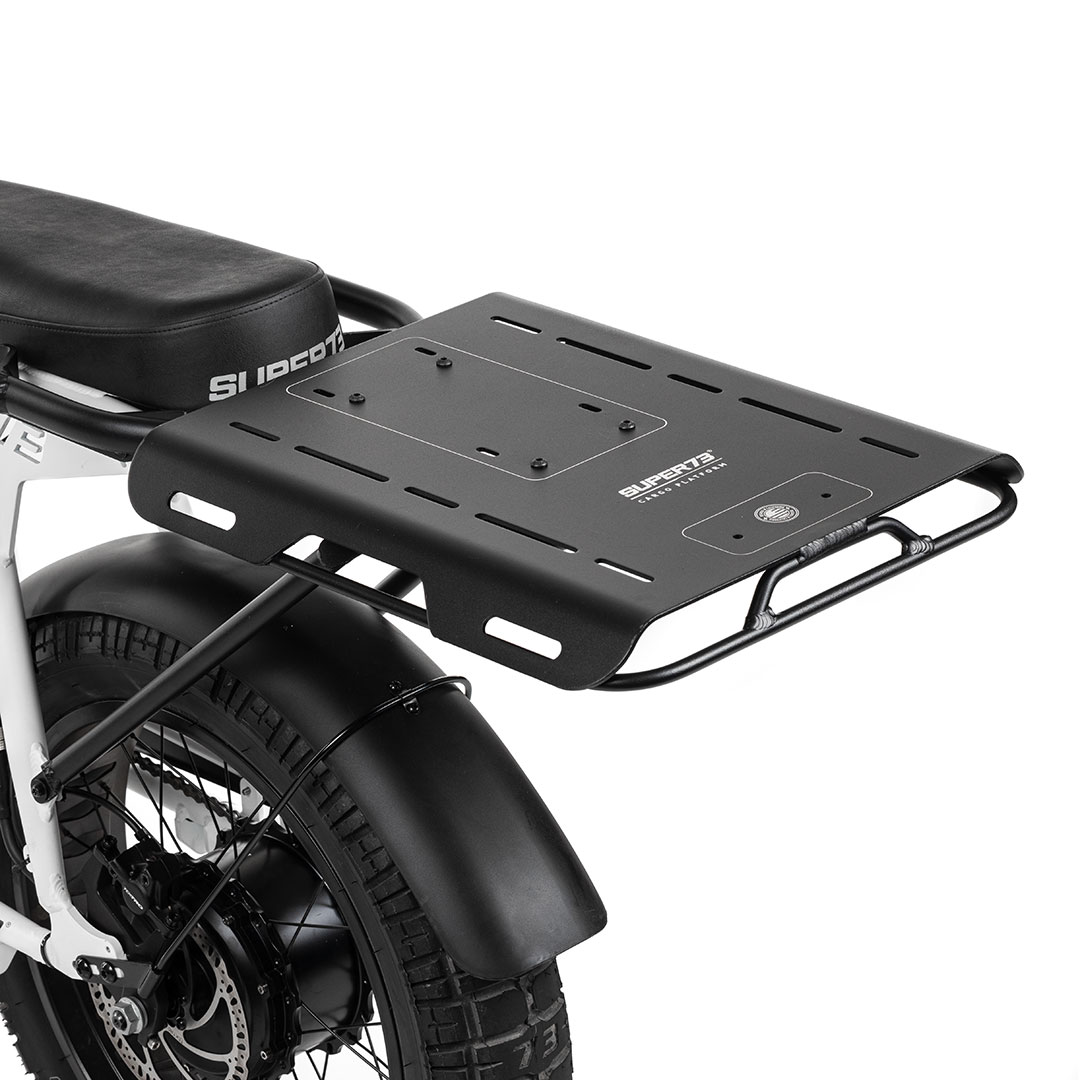 angled image of reversible cargo platform mounted to bike.