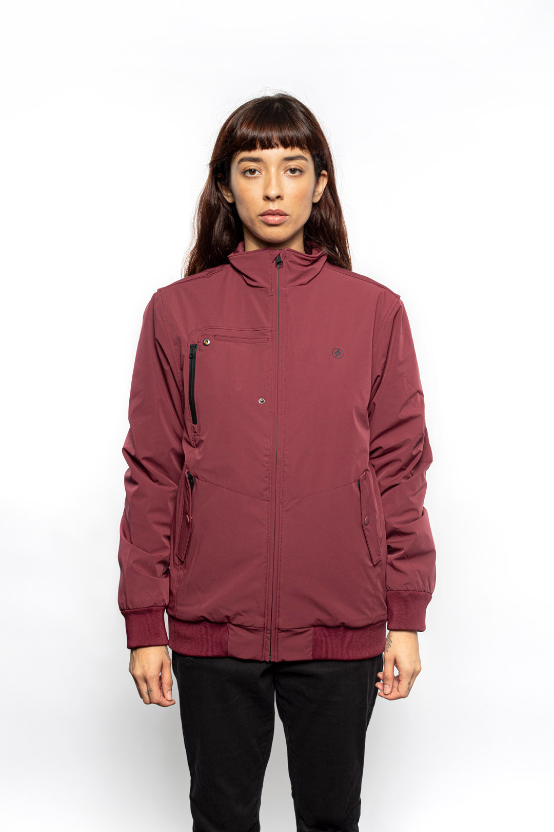 Female model wearing Royce Harrington Jacket in burgundy colorway.