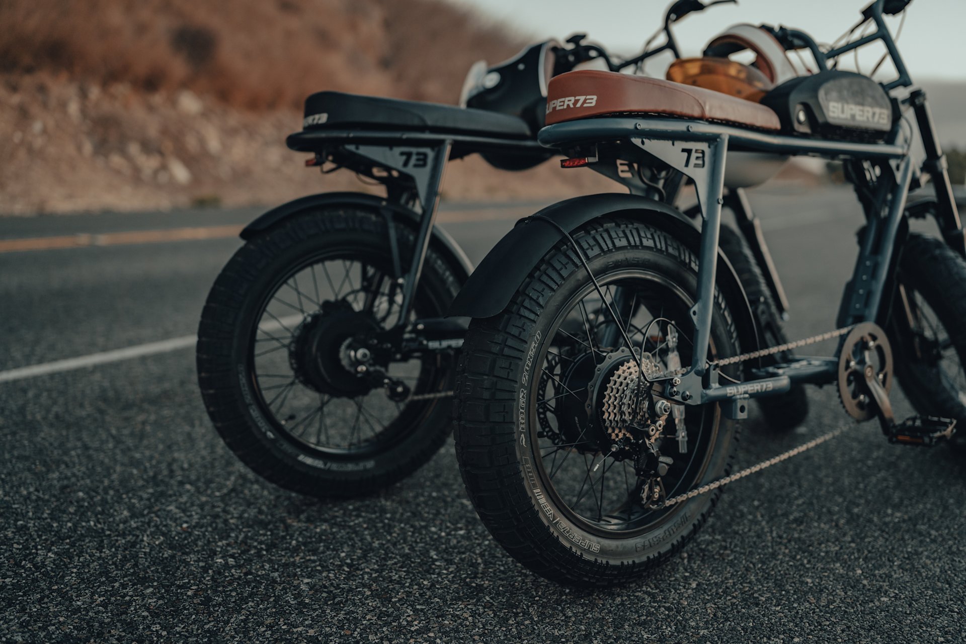Two Super73-S2s side by side on the open road