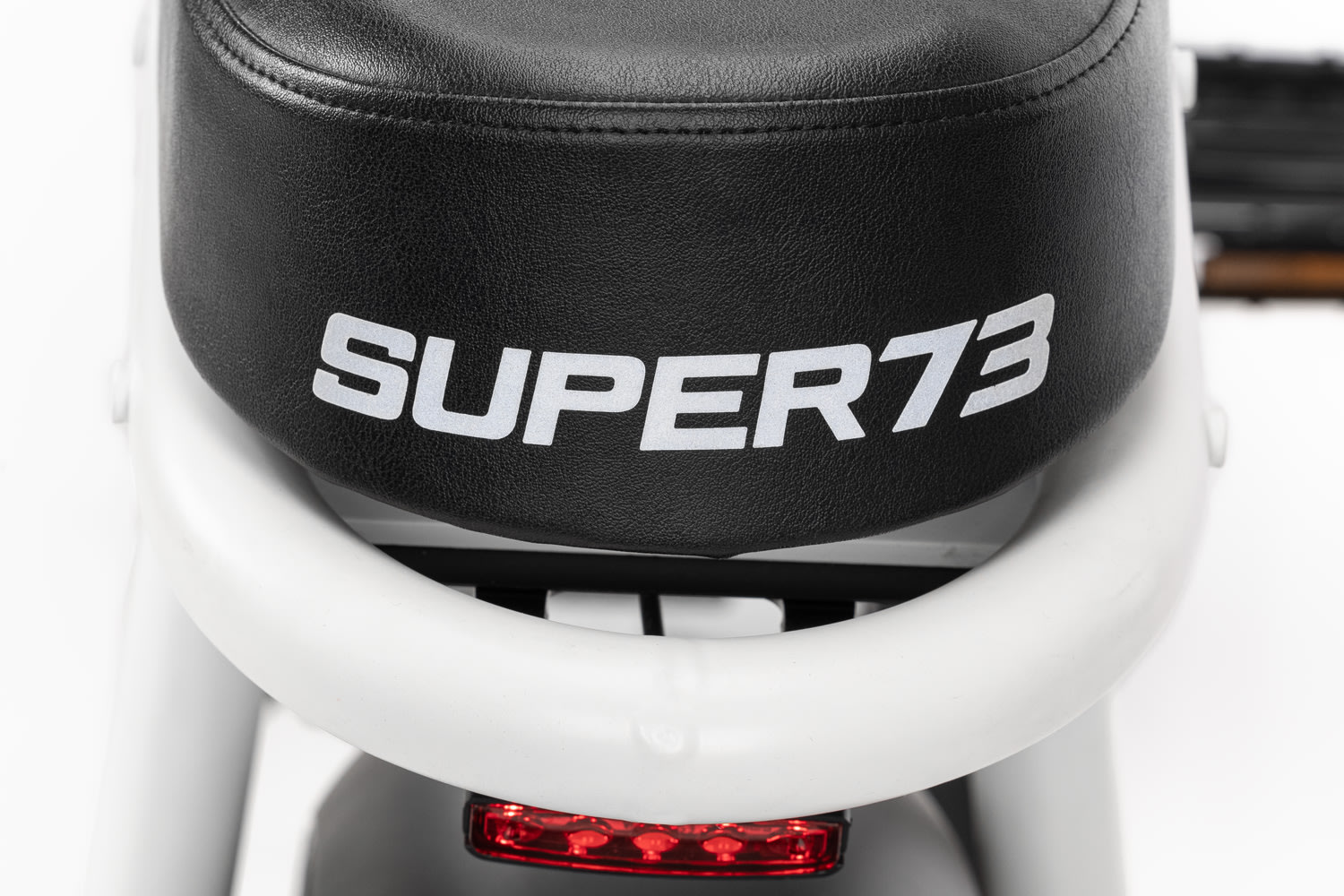 Closeup of the Super73-S2 in Bone White seat