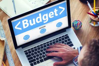 Laptop screen showing the word budget