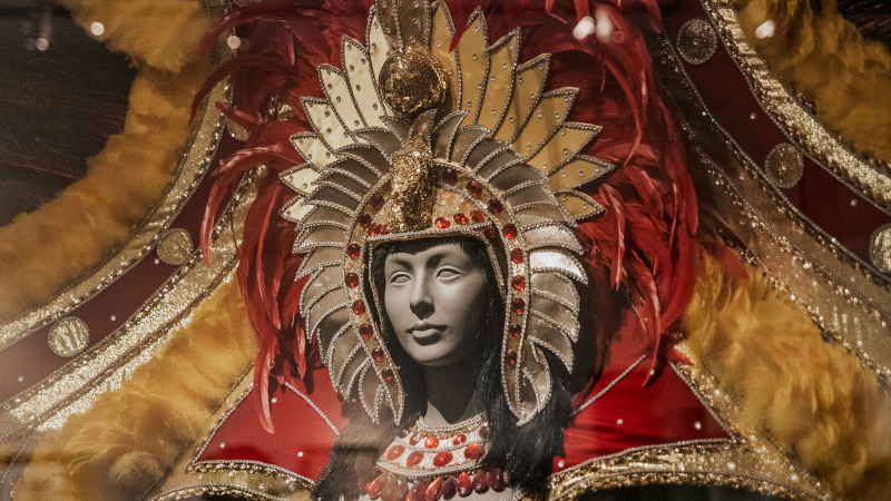 Enter the Presbytere for guided tour, including the Mardis Gras exhibit.