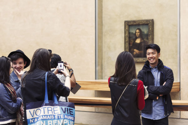 Everyone wants a picture with the Mona Lisa, but only by going late in the day can we get you a picture without everyone else in it. 