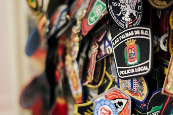 Badges from fire departments worldwide, left as a tribute in St Paul's Chapel