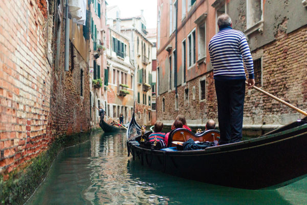 Gondolas are a good way to escape tourist crowds in Venice