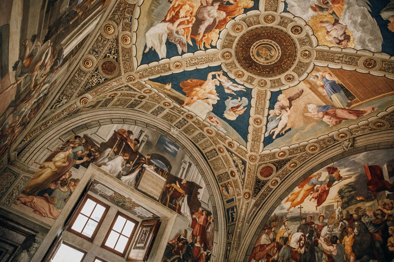 Gaze upon famed frescoes inside the Raphael Rooms