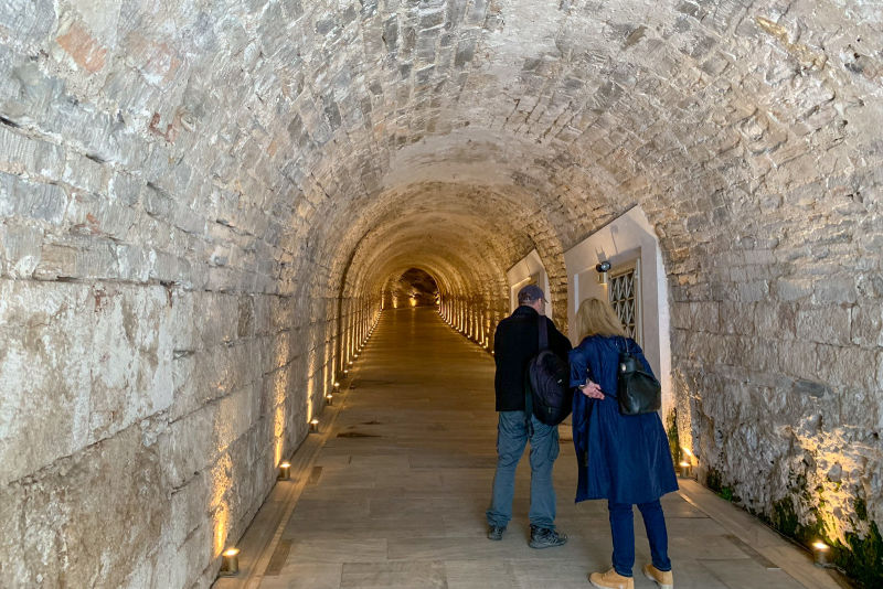 You'll walk the tunnels beneath the Panathenaic Stadium